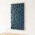 This sculptural wall panel is cast in solid concrete and reflects our signature brutalist aesthetic. Composed of layered...