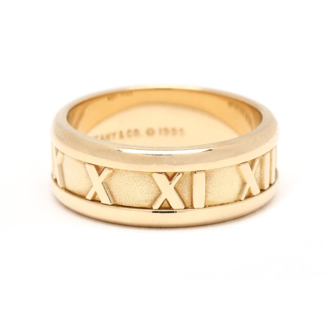 Ring Size: 6 Rise Off Of Finger: 1.5 mm Width: 7 mm Weight: 5 dwts/ 7.7 grams Metal: "Tiffany & Co 1995 750 Italy" Atlas...