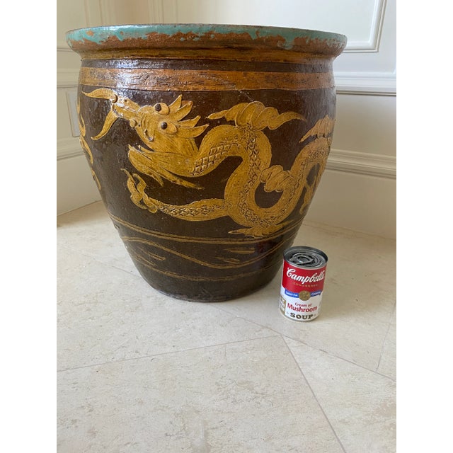 Large and heavy glazed clay vintage Dragon egg pot in shades of brown and ochre/tan with coveted interior shade of...