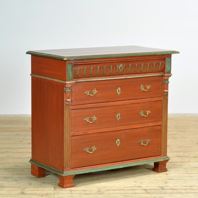 Antique pine chest of drawers, dating from around 1925 and crafted in a distinctive artisanal style. The piece features...