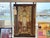 A striking hand-painted wall panel attributed to Maitland-Smith, featuring a richly detailed neoclassical interior scene...
