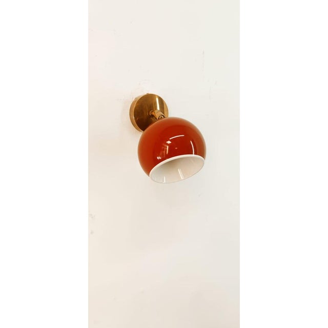 Adjustable Wall Light with Red-Colored Metal Dome, in Very Good conditions. Designed 1970 to 1979 Up to 250V (Europe/UK...