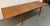 Timeless Danish Mid-Century Modern draw-leaf dining table designed by Skovmand & Andersen for Moreddi, showcasing the...