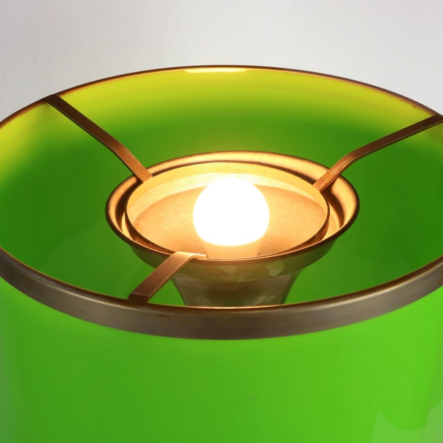 An imposing and dramatic large-format table lamp, made in Italy in the 1970s. The central body is composed of a large...