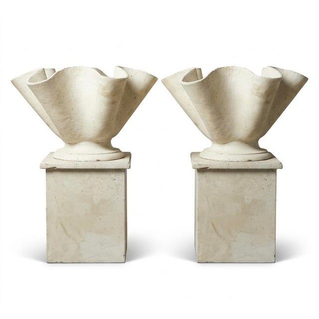 This pair of 1990s cast iron planters on matching pedestals captures the elegant, organic brutalism of Swiss designer...
