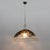 This pendant lamp features a transparent murano blown glass bell-shaped lampshade with blue, black and brown murrine...