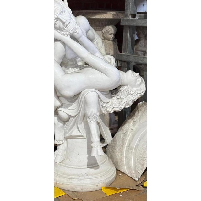 A magnificent life-sized sculpture of Pan, the ancient Greek god of nature, fertility, and sexuality, meticulously carved...