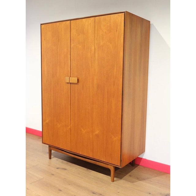 Wood Mid Century Modern Vintage Teak Armoire Wardrobe by G Plan Kofod Larsen For Sale - Image 7 of 13