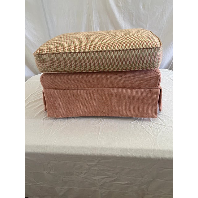 Footstool with pink tweed base with attached geometric top which makes it functional, comfortable and beautiful.