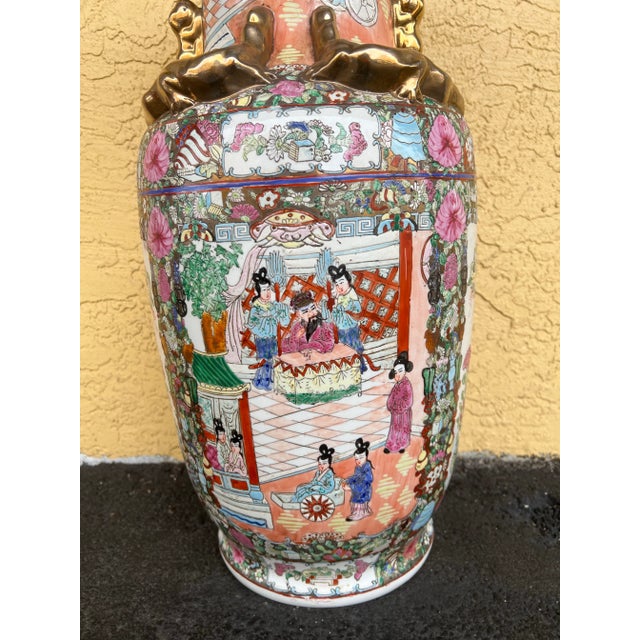 Mid 20th century Famille Rose Porcelain vase. Measuring 24” Tall with 9.5” Opening Diameter.