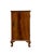 This bedside cabinet features a compact rectangular form with a richly figured veneer on the front door, displaying a...