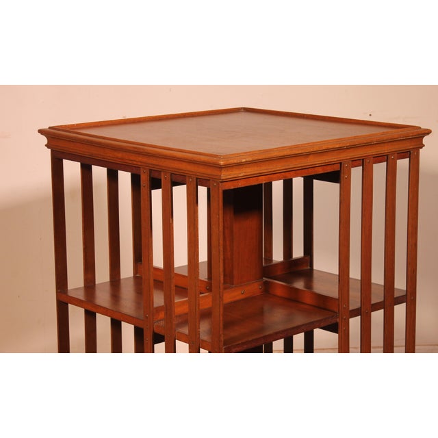 Exquisite early 20th-century revolving bookcase in light mahogany. A very beautiful, large, and uncommon model that allows...