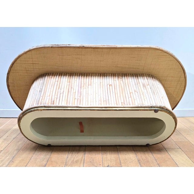 Designer coffee table. Made entirely of wood and rattan. Original design. Table height: 35cm. In used condition. Perfect...