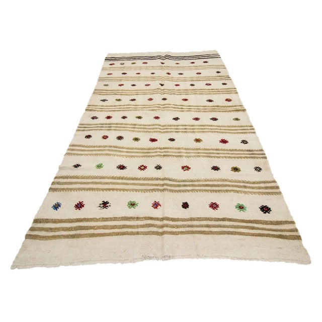Handwoven vintage hemp kilim rug from Yozgat region of Turkey. Approximately 50-60 years old. In very good condition.