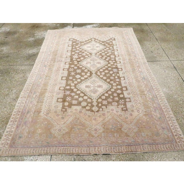 A vintage Persian Afshar accent rug handmade during the Mid-20th century. Measures: 5' 3" x 7' 8"