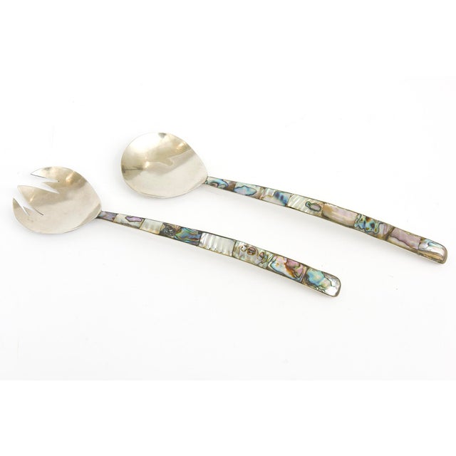 These vintage lovely silver-plate and abalone salad servers or serving pieces are marked Mexico. From the 70's. They are...