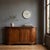 A mid-19th-century Italian-made walnut cupboard. It features a pair of paneled doors on the front, flanked by curved...