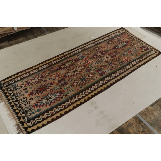 Handwoven in wool, this antique Kilim is the latest unveiled from R&K Principal Josh Nazmiyal’s coveted treasury of flat...