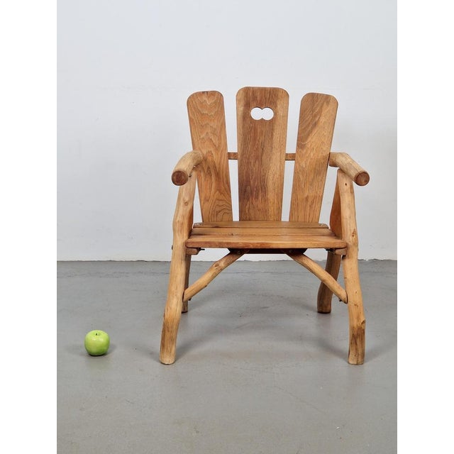 Vintage brutalist chair wood armchair ’80 France very solid chair in brutalist design 1980s. The chair has a solid wooden...