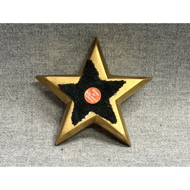 A heavy brass star paperweight ready for your desk. The paper weight has a very nice reflective finish and is sturdy...