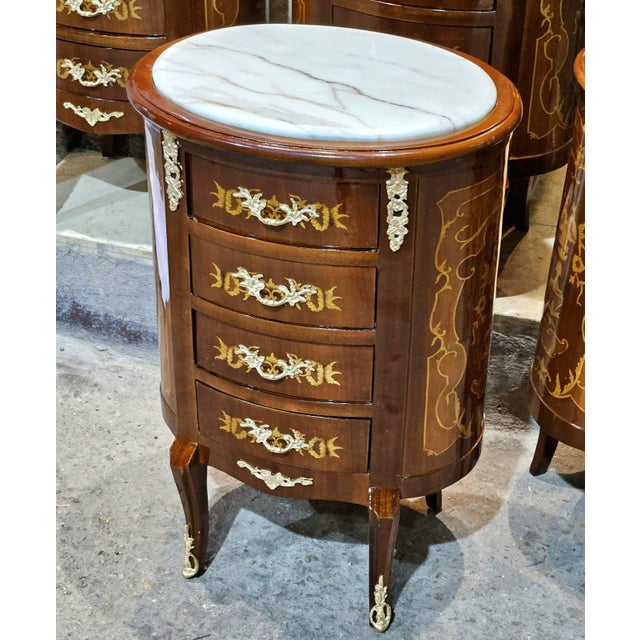 Add timeless European elegance to your space with this beautiful French-style commode featuring a luxurious marble top and...