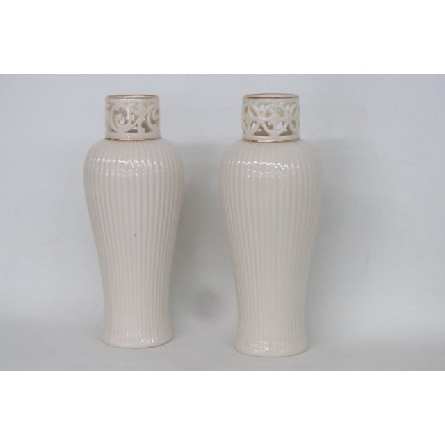 This gorgeous Pair of 2 Vases are made of porcelain. These lovely vases are stamped on the bottom as being made in the USA...
