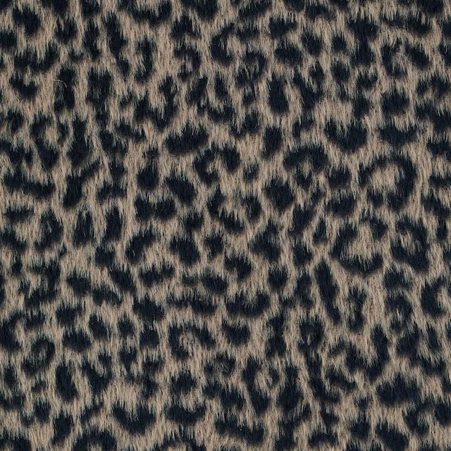 A alluring blend of baby alpaca and virgin wool gives this chic leopard pattern its soft, dreamy texture. It's a fabulous...