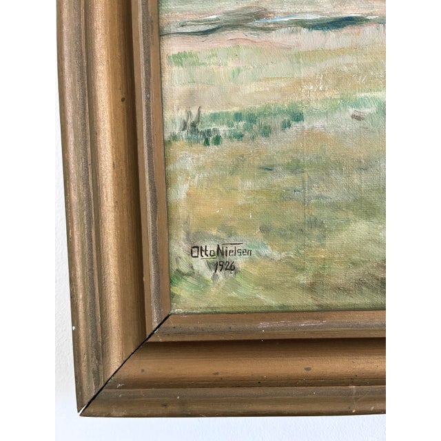 This antique original oil painting, signed and dated 1926, shows a light countryside landscape with a large tree, open...