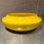 For your consideration, a vintage Mid-Century Modern "UFO" style yellow ceramic bowl, which commonly served as a florist's...