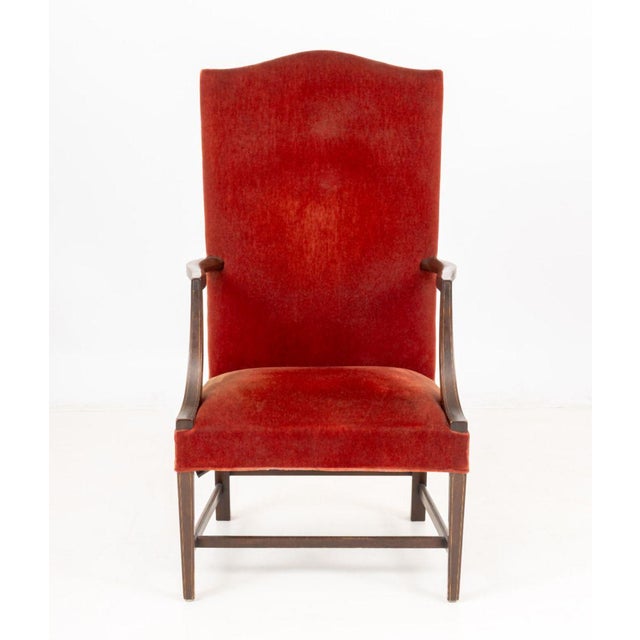 Federal Style Mahogany Lolling Arm Chair, with burnt orange upholstery on four tapered legs. 48" H x 25.5" W x 23.25" D;...