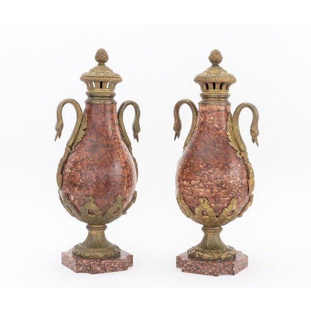 Pair of French Neoclassical Style Ormolu Mounted Rouge Griotte Urn Forms, each with two swan head form handles. 20.75" H x...