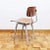 This model Revolt chair, designed by Friso Kramer in 1953, was manufactured by Ahrend de Cirkel, the Netherlands. This...