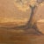 A quiet and atmospheric early 20th century landscape painting depicting a solitary tree set within rolling earth beneath a...