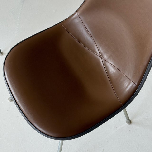 c. 1970s. USA. Price is for the set. Contact us if you’d like to purchase a single item. Vinyl upholstered shell chairs.