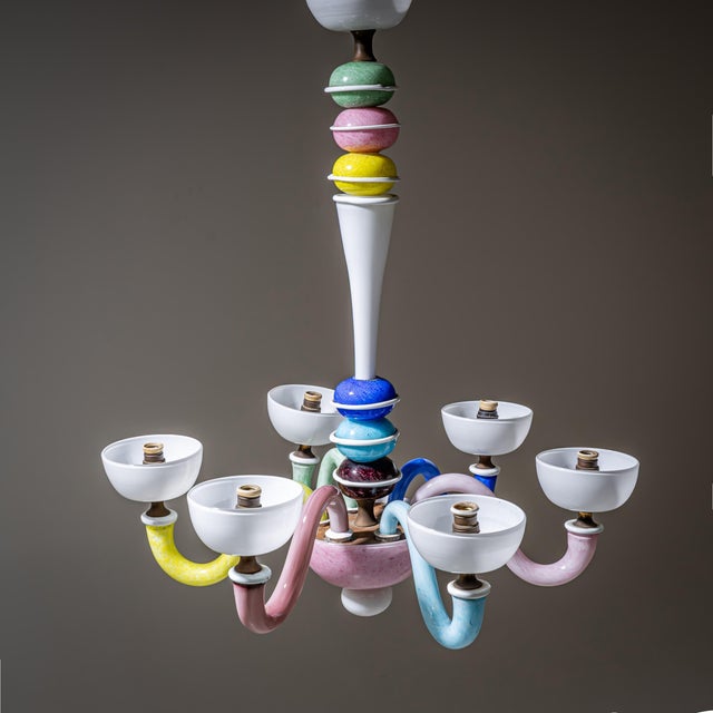 Glass chandelier composed of colorful glass elements with six chandelier arms in soft pastel tones. Please note: We assume...