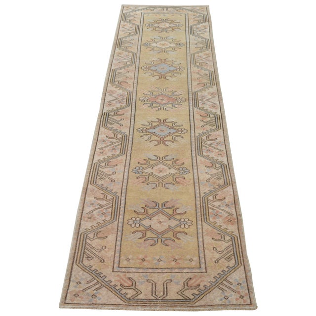 Hand-knotted with care using traditional rug-making techniques, this wool rug blends timeless craftsmanship with a modern...