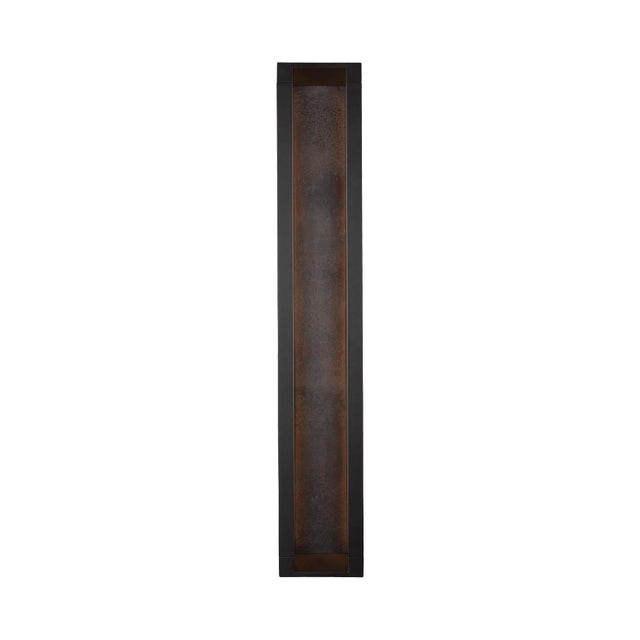 The Sean Lavin Mattix one light outdoor wall fixture in oil rubbed bronze creates a warm and inviting welcome presentation...