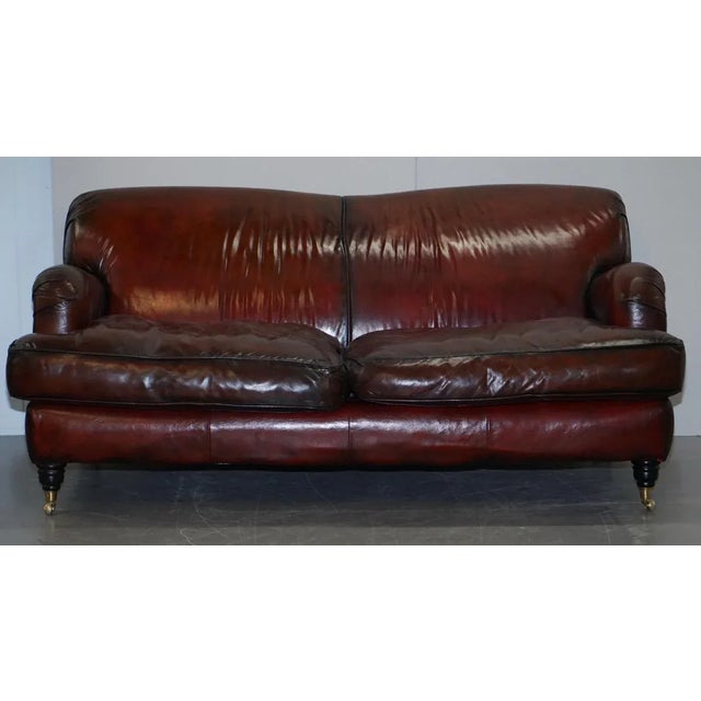 Nicely restored Bordeaux brown leather three seat sofa A good looking and decorative sofa, the leather has been...
