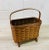 Vintage 1960s oak split wood handled magazine rack or basket with oak wood feet. The basket could serve as a magazine rack...