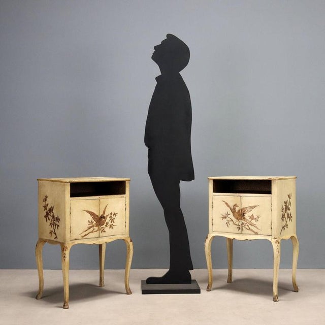 A pair of late Baroque-style bedside tables, made in Italy in the late 19th century. These pieces feature an open...
