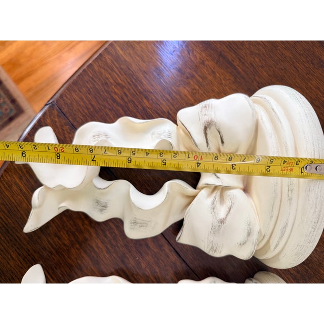 Bring classic grandmillennial charm to your walls with this beautifully curated pair of ribbon bow decorative wall...