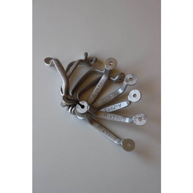 Metal Set of 10, French Industrial Cast Aluminum Drawer Pulls For Sale - Image 7 of 8