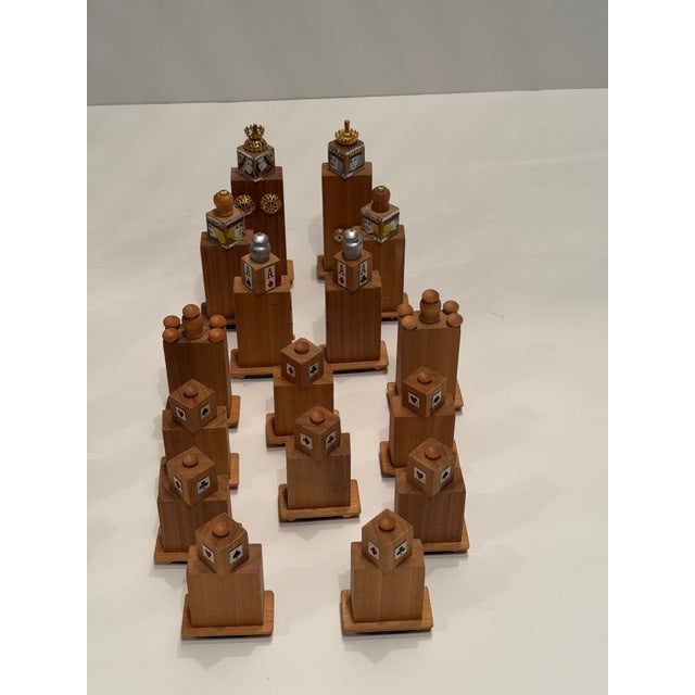 Marvelously detailed handmade carved wood set of 32 chest pieces having wonderful embellishments with card motifs such as...