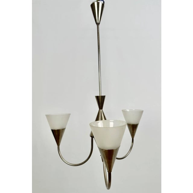 One of a total of three ceiling/pendant lights (German? Czech? Scandinavian?) from the 1930s. Beautifully balanced, three-...