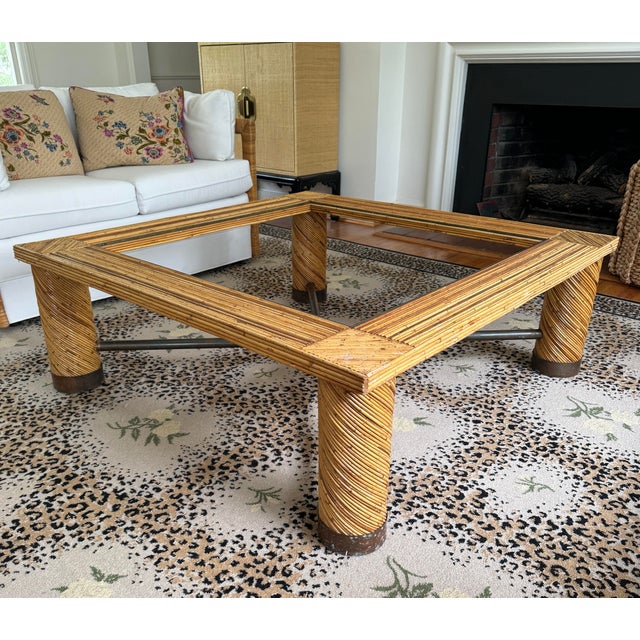 Large Marcello Mioni vintage pencil reed coffee table. Brass edges, brass caps, brass stretchers. Smoked glass inset top....