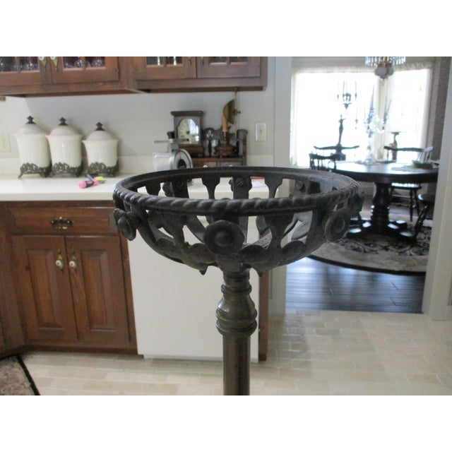 The product is an antique ornate cast iron and brass piano organ lamp holder with birds by Bradley & Hubbard. It is...