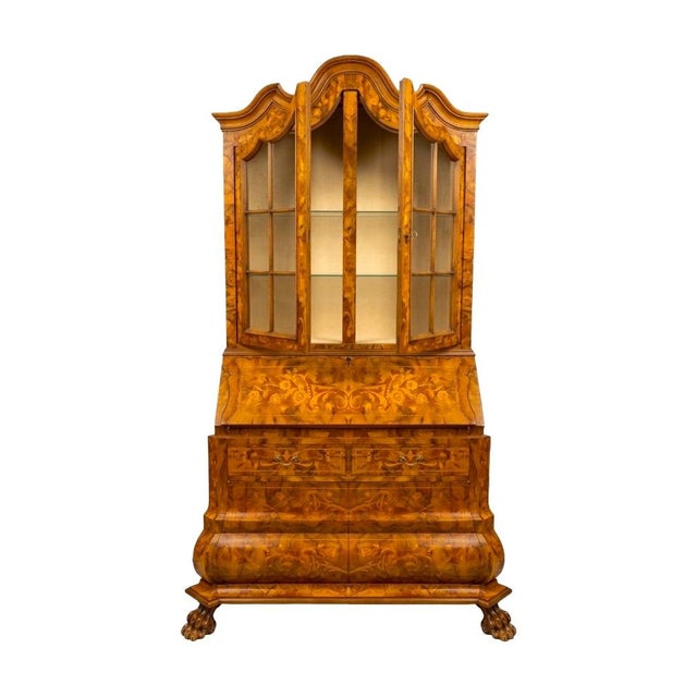 Early 20th century Dutch marquetry trumeau library cabinet with drop-front desk, finely crafted in burl walnut and richly...