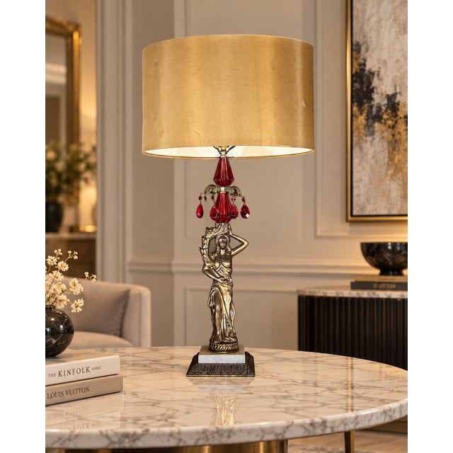 Hollywood Regency-Inspired Figural Table Lamp With Red Crystal Drops, 33” Description: A dramatic decorative table lamp...