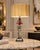 Hollywood Regency-Inspired Figural Table Lamp With Red Crystal Drops, 33” Description: A dramatic decorative table lamp...