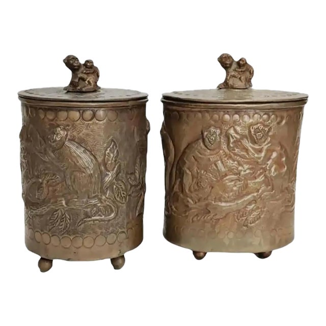 1990s Castilian Imports Brass Embossed Monkey Canisters- Set of 2 For Sale